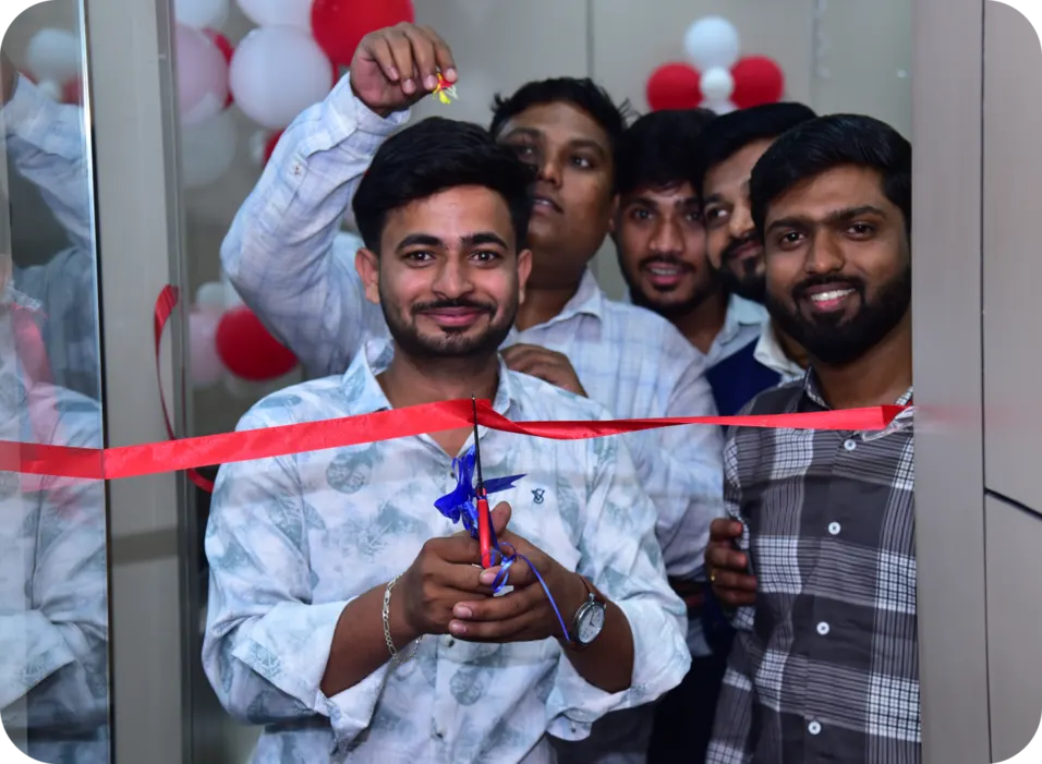 The team at the ribbon-cutting for Sumago's new office