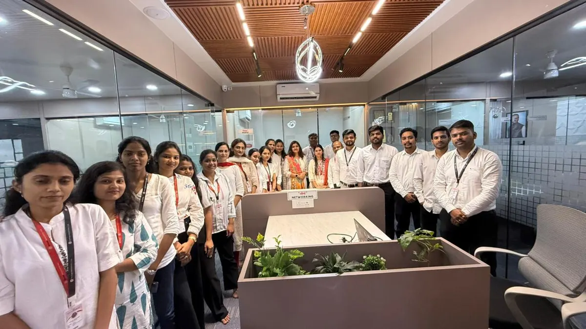 The team gathered on the Sumago office floor