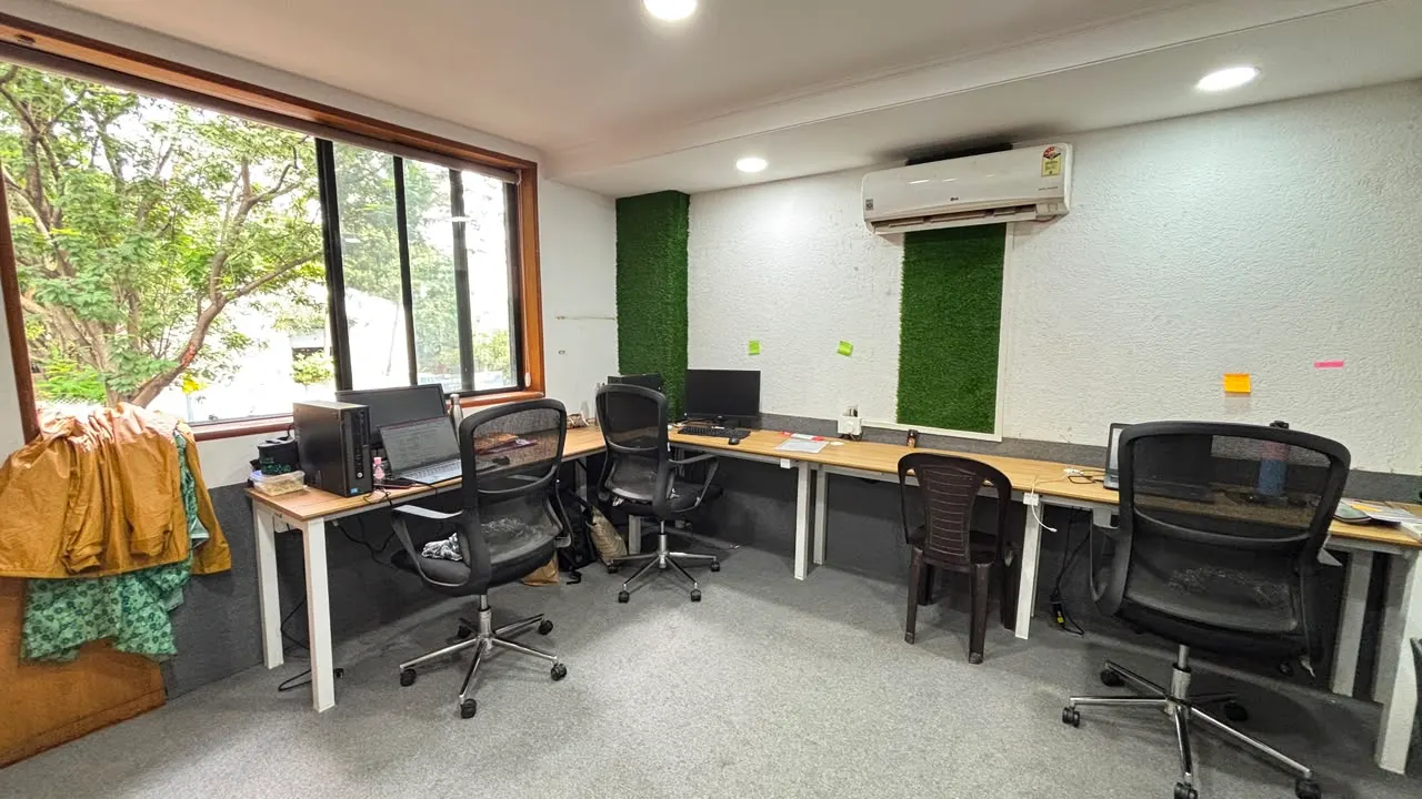Workstations along the window at Sumago's office